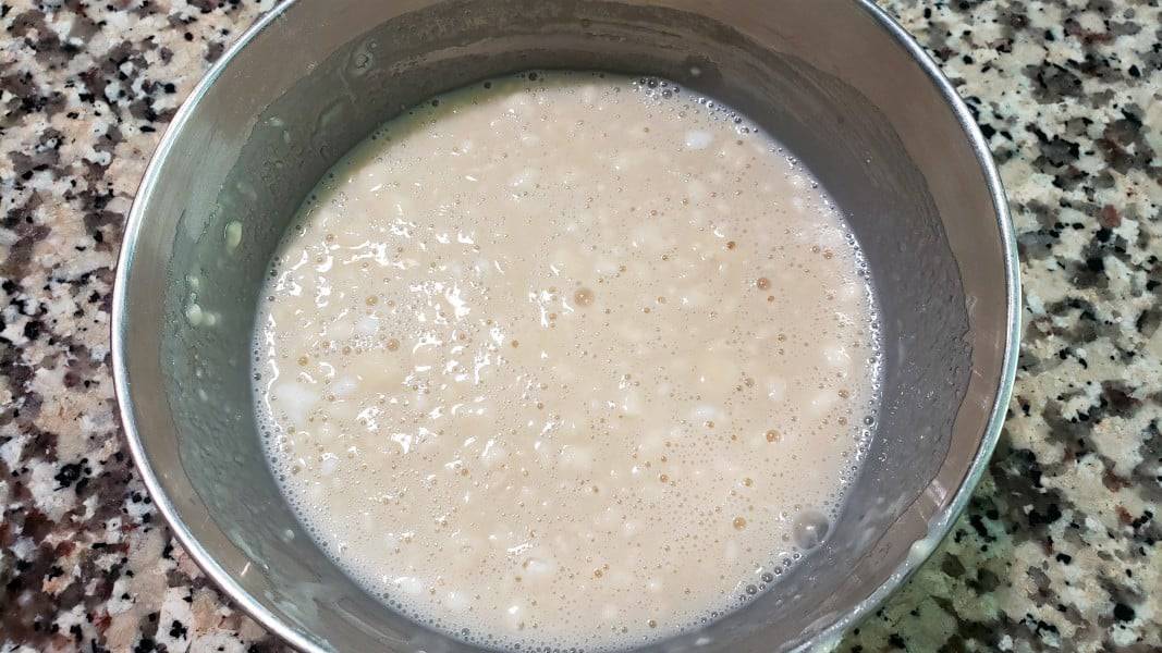 cobbler batter in a silver bowl.