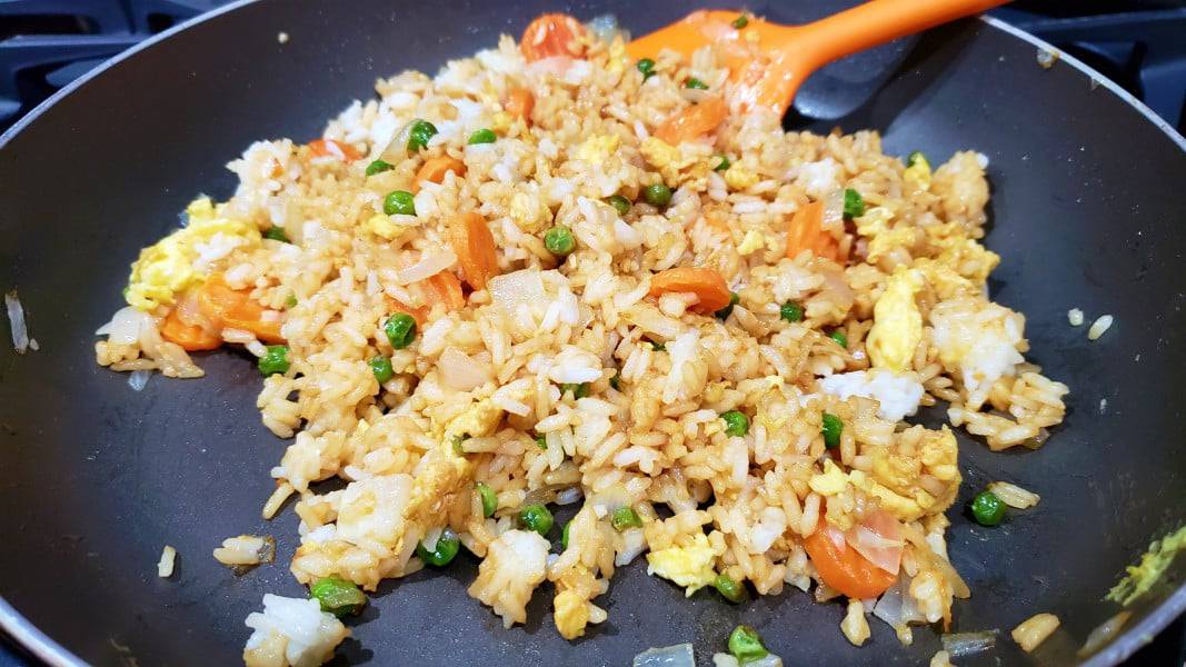 easy fried rice from scratch cooking in a pan.