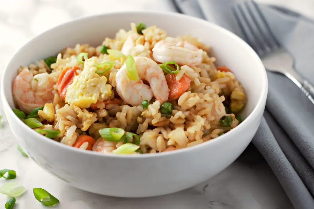 simple Shrimp Fried Rice from scratch in a white bowl.