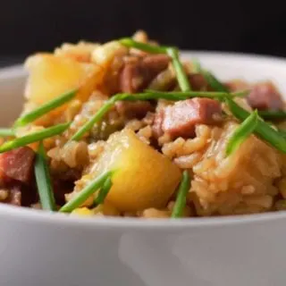 a bowl filled with Hawaiian Fried Rice.