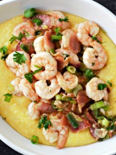 Shrimp and Polenta with Bacon in a oval bowl.