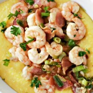 Shrimp and Polenta with Bacon in a oval bowl.