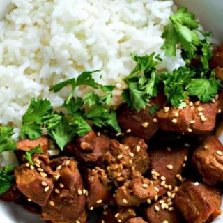 Slow Cooker Teriyaki Chicken in a bowl with rice.