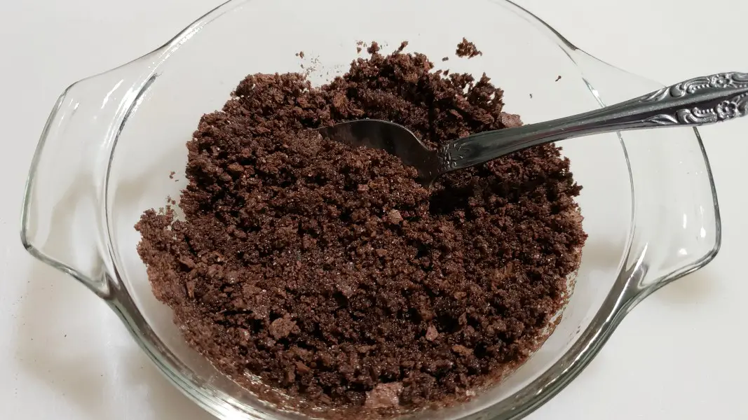 chocolate graham crumbs mixed with butter.