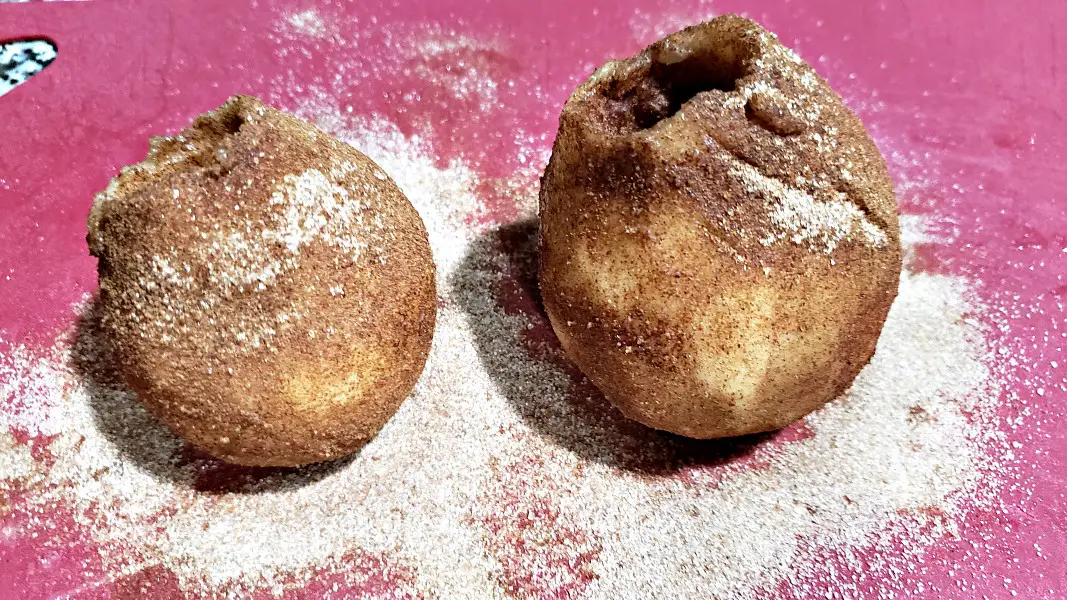 two pears covered in cinnamon mixture.