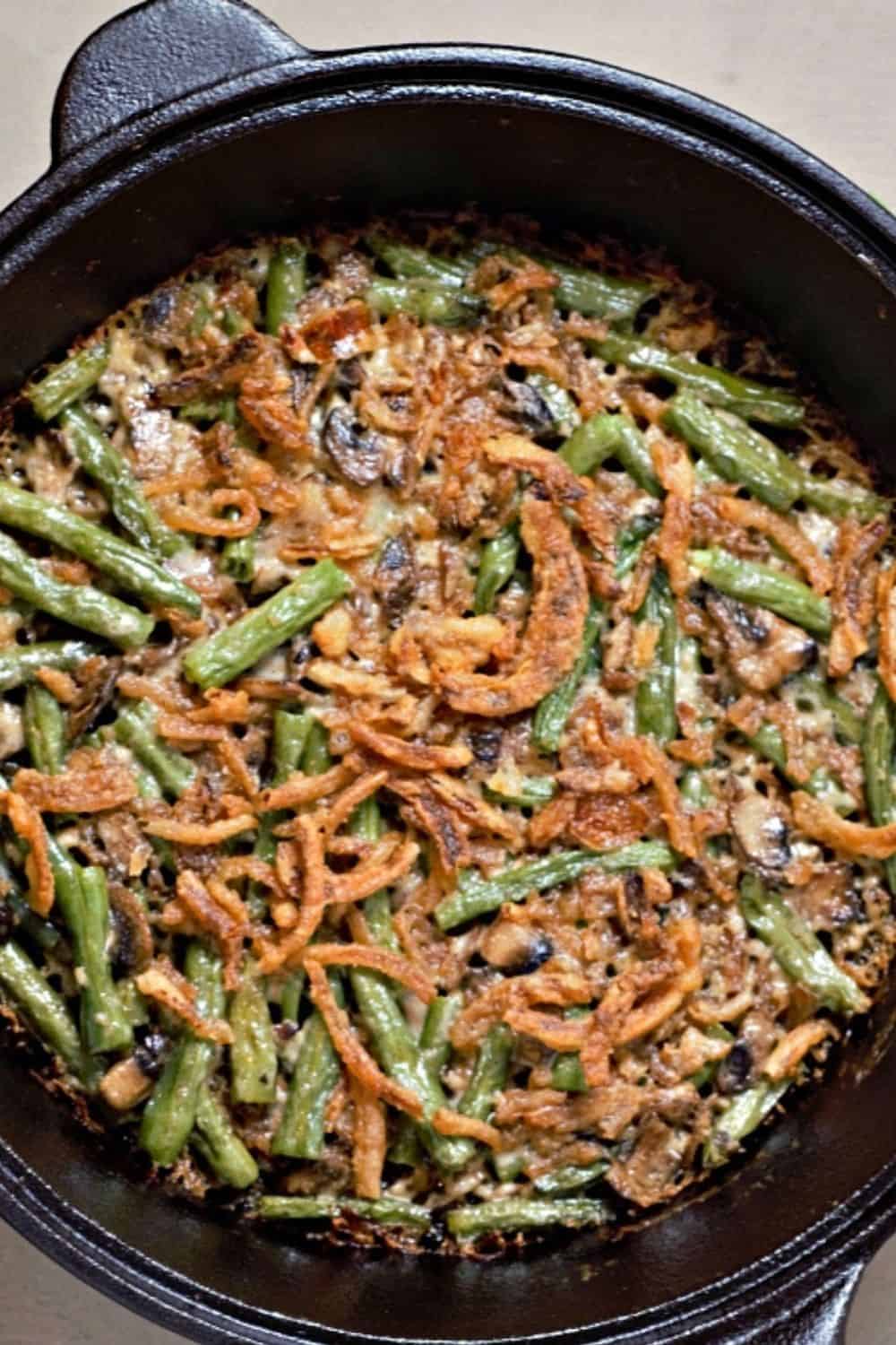 Green Bean Casserole in a cast iron skillet.