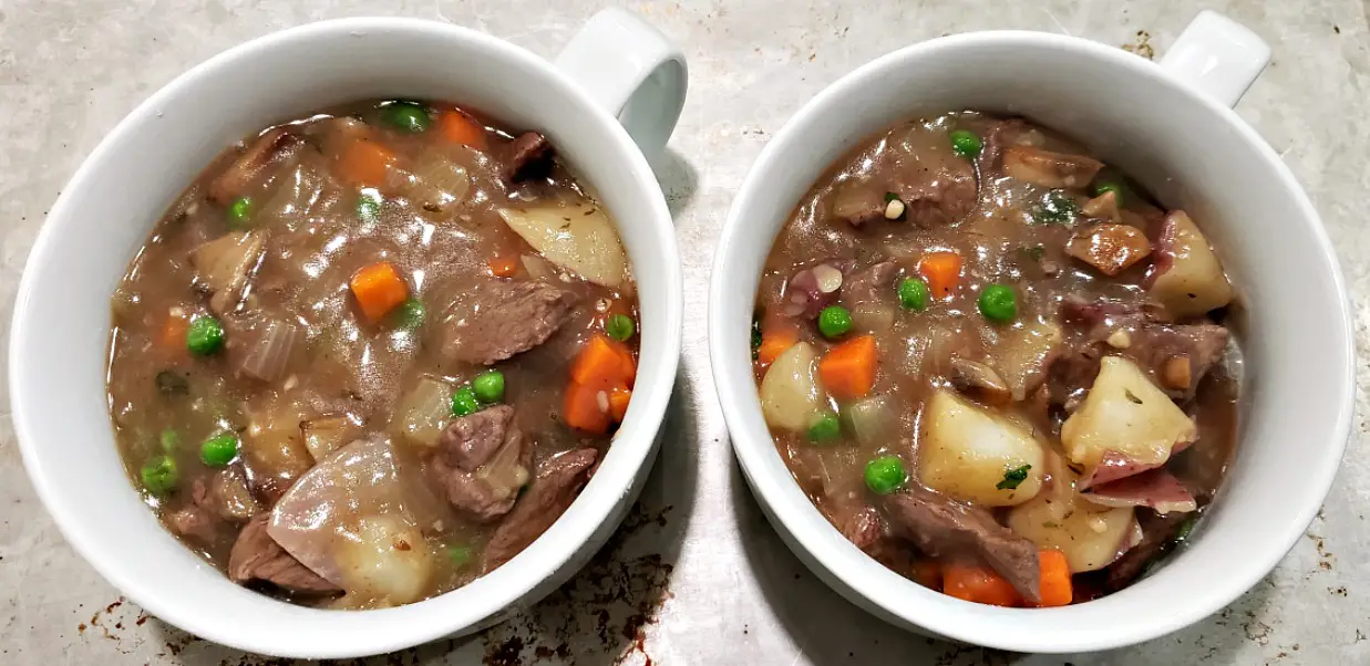 beef pot pie filling poured into to bowls