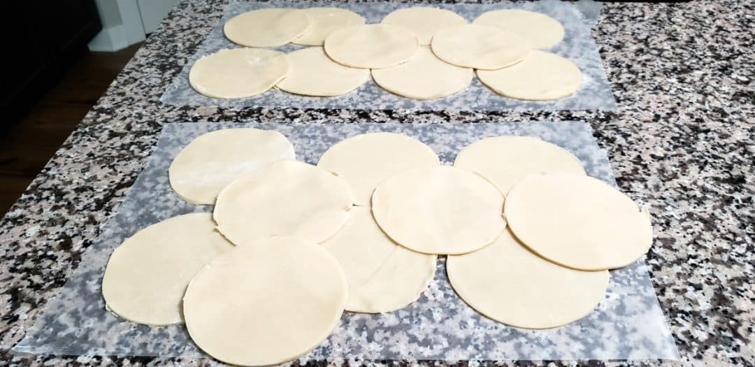 20 pie crust circles on wax paper