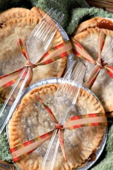 3 Mini Caramel Apple Pies in a basket.