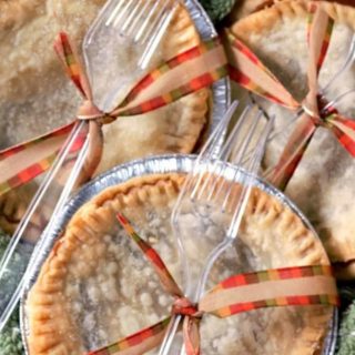 3 Mini Caramel Apple Pies in a basket.