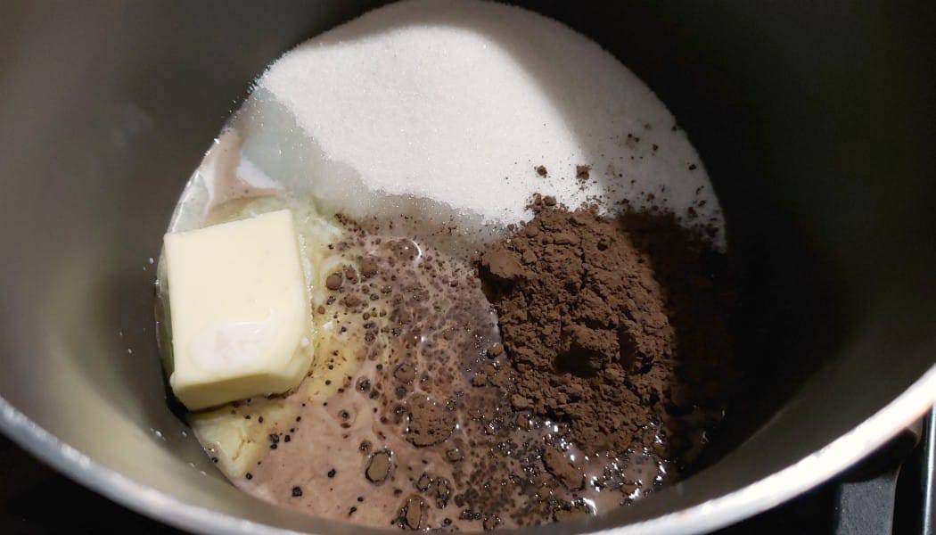sugar, butter, dark cocoa, and milk in a sauce pan