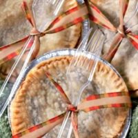 3 Mini Caramel Apple Pies in a basket.