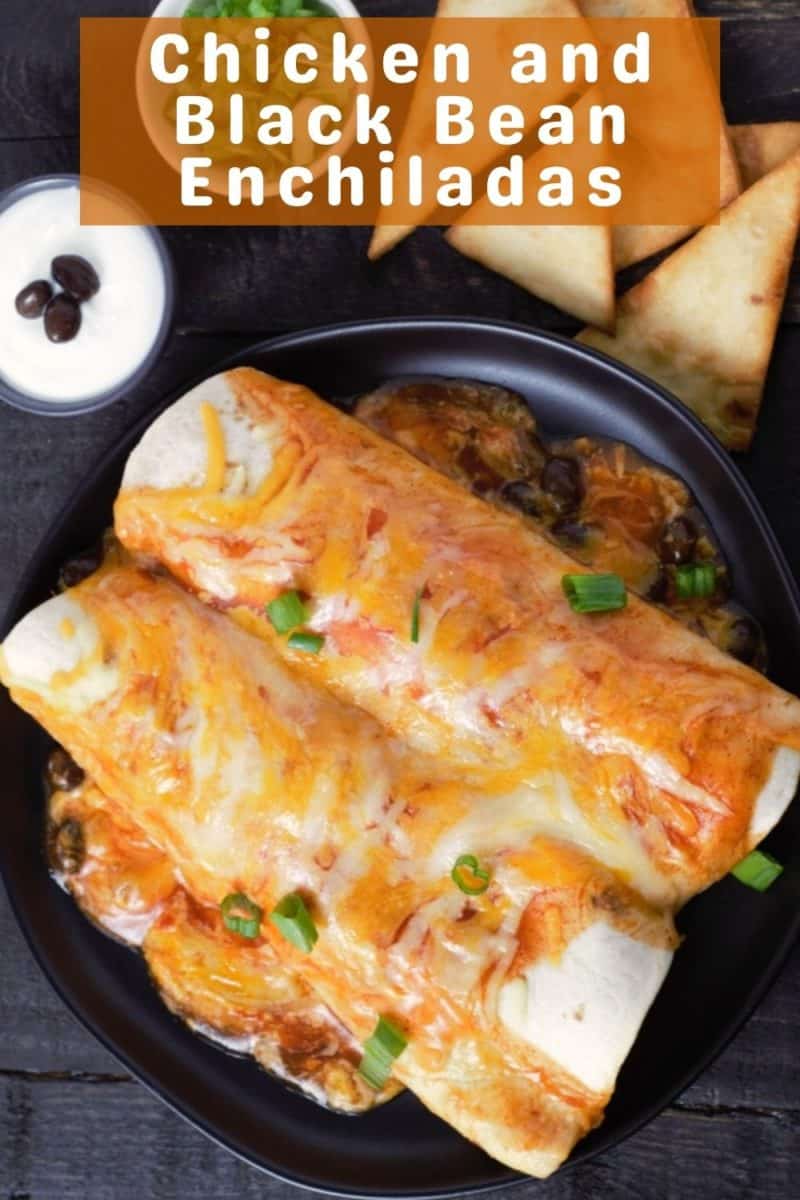 two Chicken and Black Bean Enchiladas on a plate.
