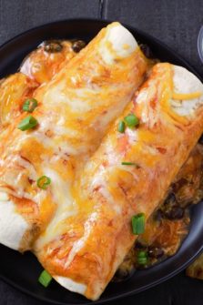 Chicken and Black Bean Enchiladas on a plate.