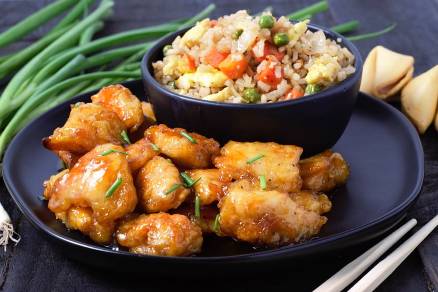 Sweet and Sour Chicken on a plate with Homemade Fried Rice