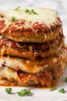 a stack of Eggplant Parmesan on a plate.