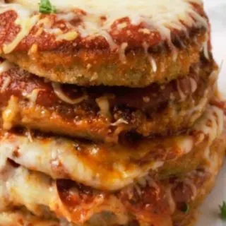 a stack of Eggplant Parmesan on a plate.