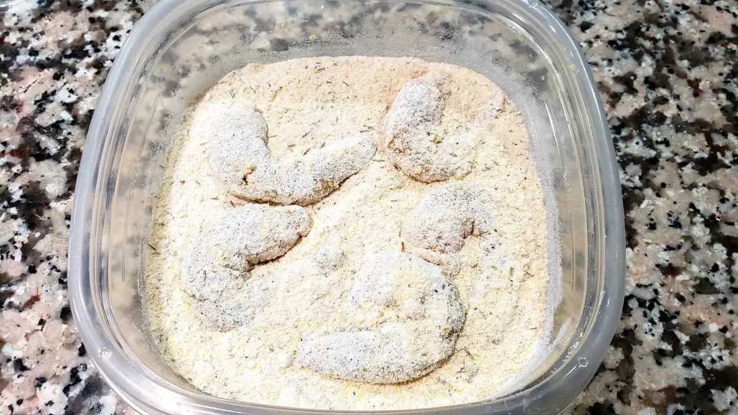 shrimp coating in the breading mixture