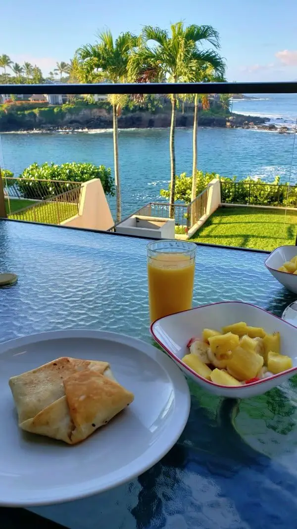 condo lanai view with breakfast on the table