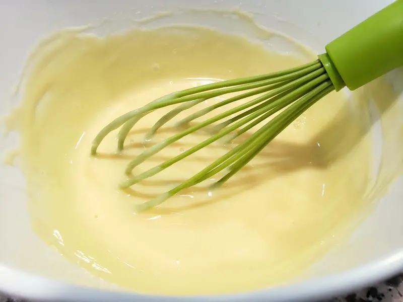 key lime pie filling whisked in a bowl