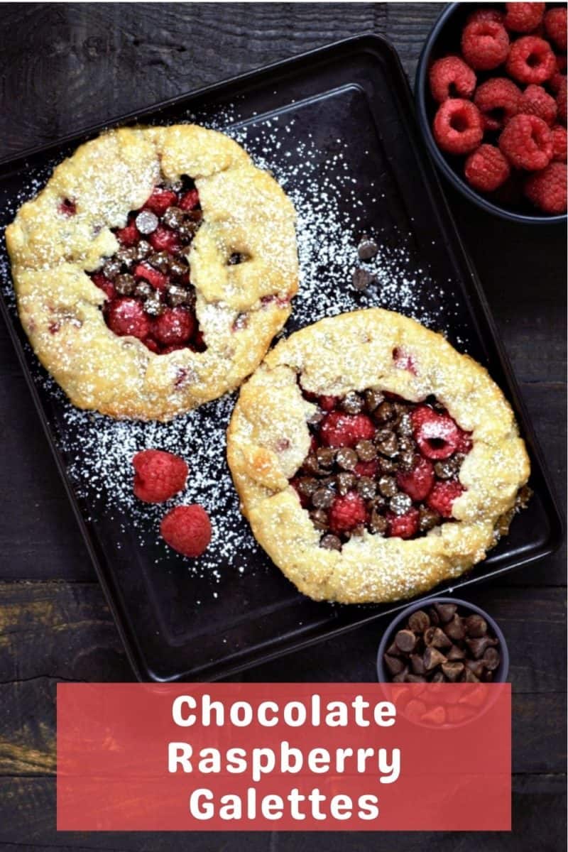 two Individual Chocolate Raspberry Galettes on a tray.