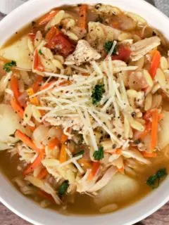 Tuscan Orzo Chicken Soup in a bowl.