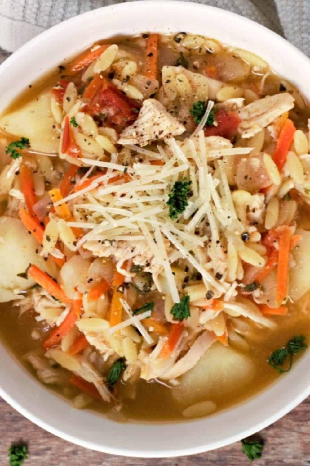 Tuscan Orzo Chicken Soup in a bowl.