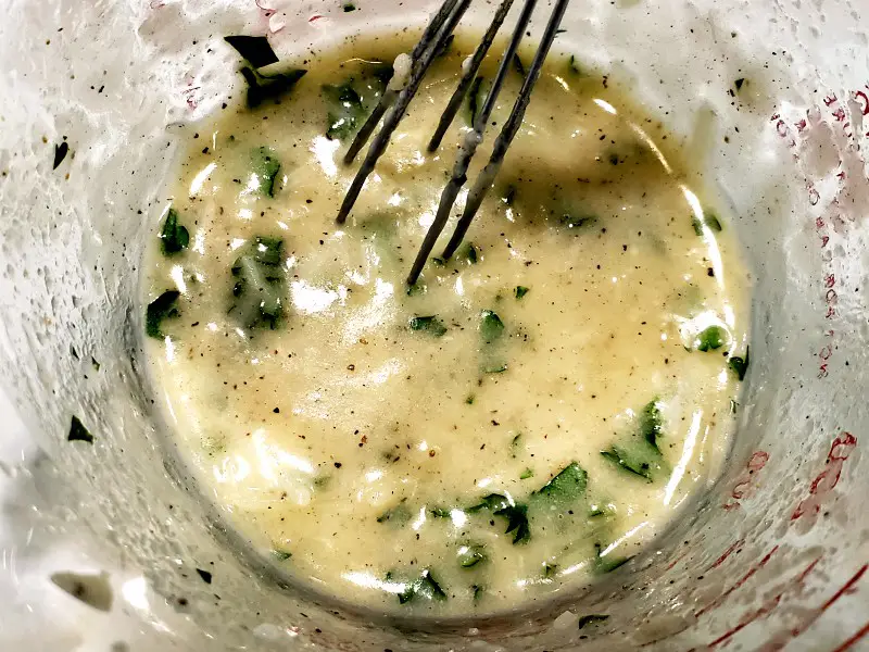 butter Parmesan cheese mixture whisked together