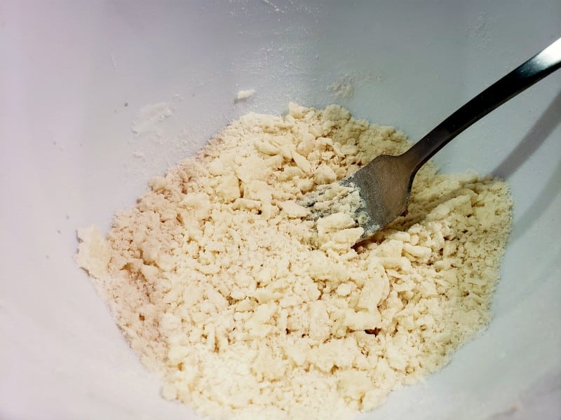 flour, baking powder, salt, baking soda, sugar, and shortening blended with a fork