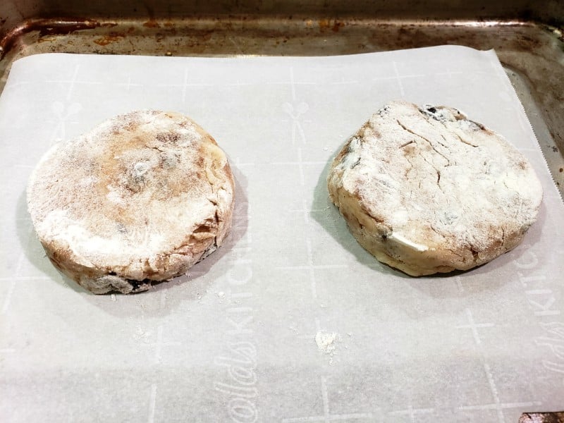 two biscuits placed on a baking sheet