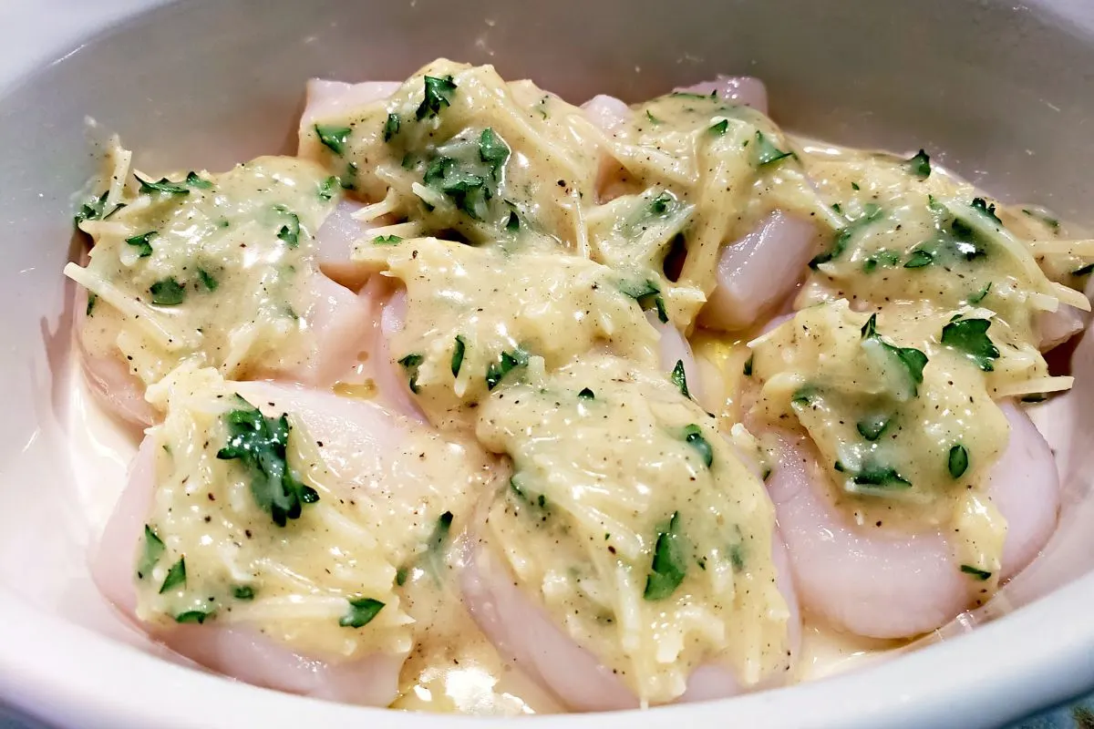 Buttery Parmesan Scallops in a casserole dish.