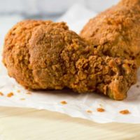 Fried Chicken on parchment paper.