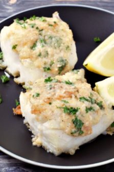 Cod with Garlic Butter on a plate.