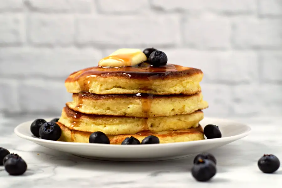 a stack of 4 homemade fluffy pancakes