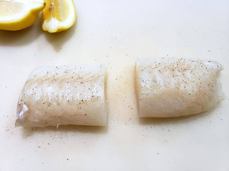 2 cod fillets seasoned with salt and pepper