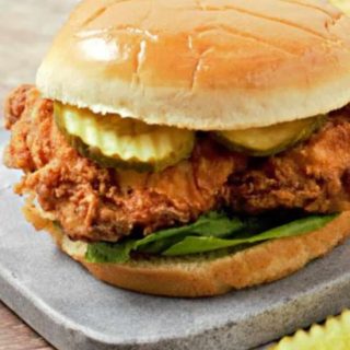 Crispy Fried Chicken Sandwich on a cutting board.