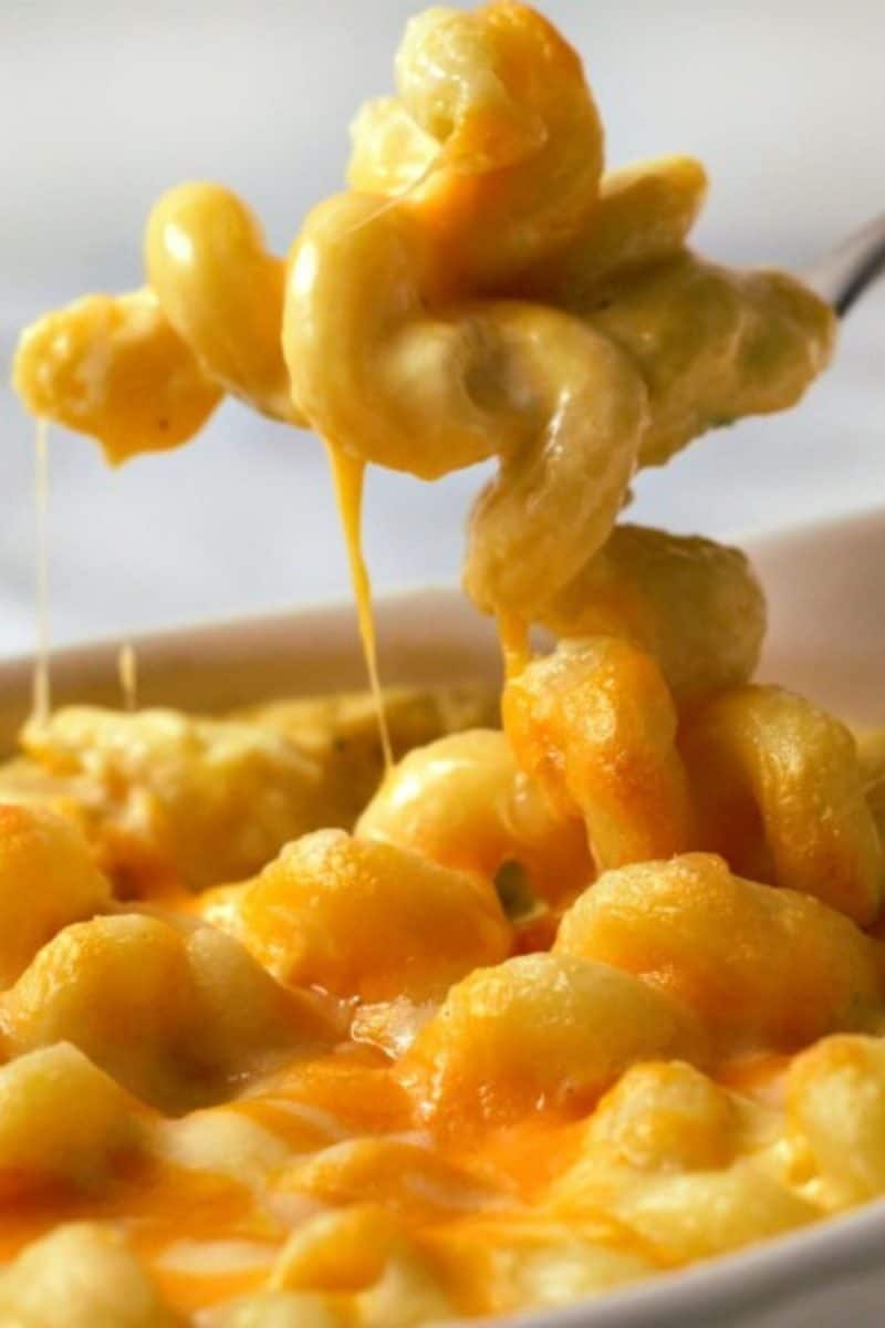 Macaroni and Cheese with a spoon lifting some out.
