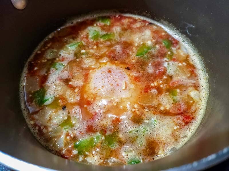 chicken fajita soup cooking in a sauce pan