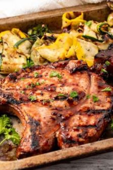 Grilled Honey Garlic Pork Chops on a tray.