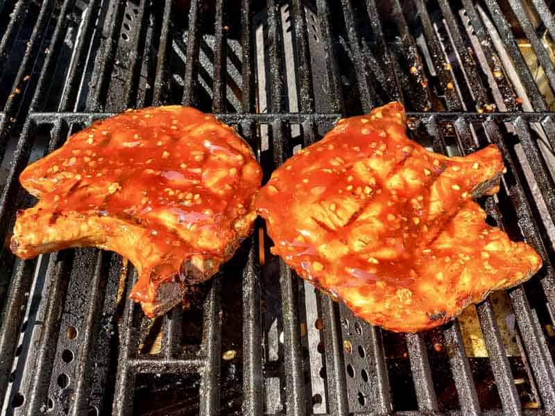 two chops on a grill.