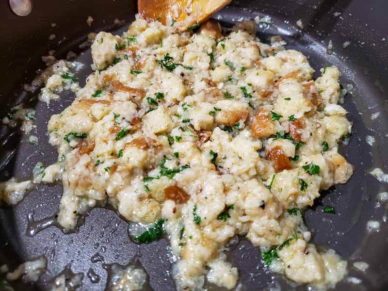 Stuffing for Baked Stuffed Shrimp in a frying pan.
