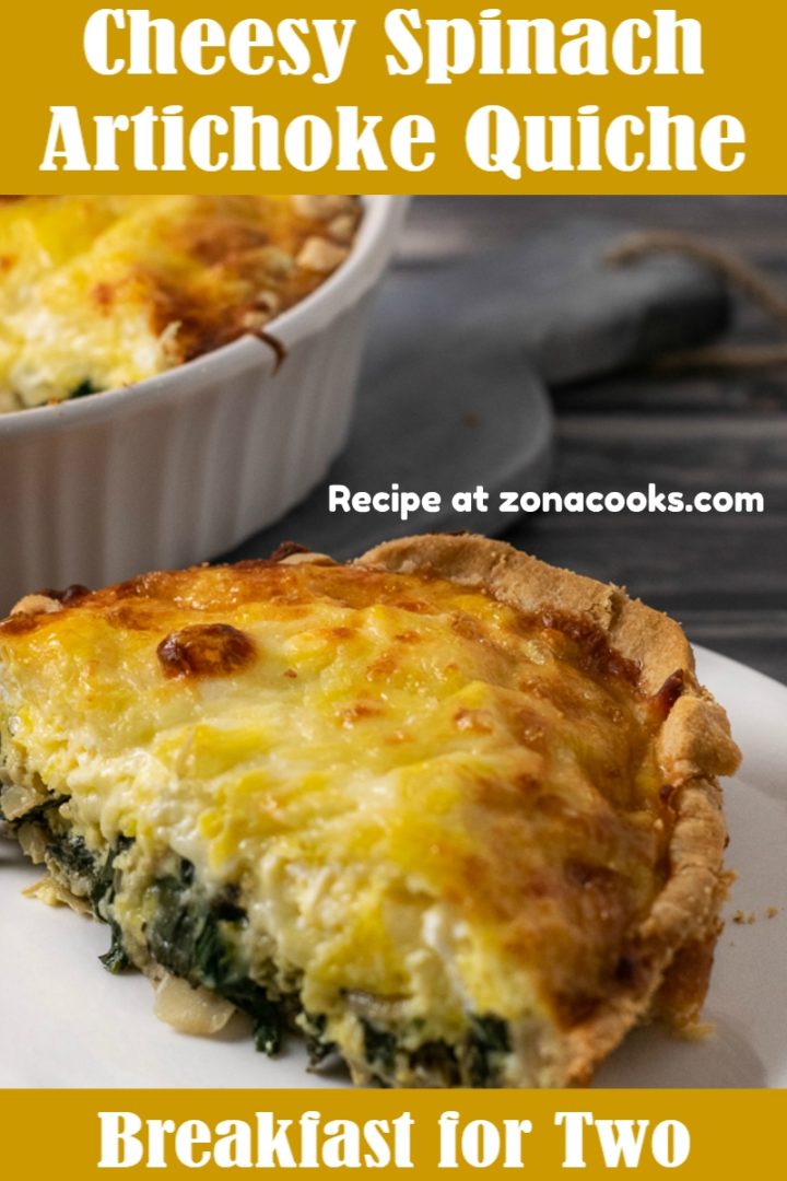 slice of spinach and artichoke quiche on a plate.
