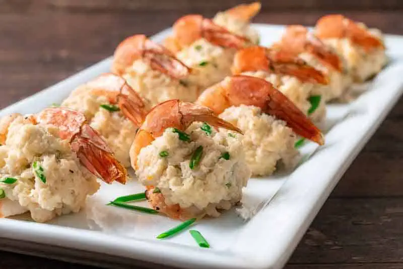 crab stuffed shrimp on a platter