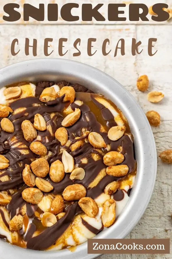 Snickers Cheesecake topped with peanuts.