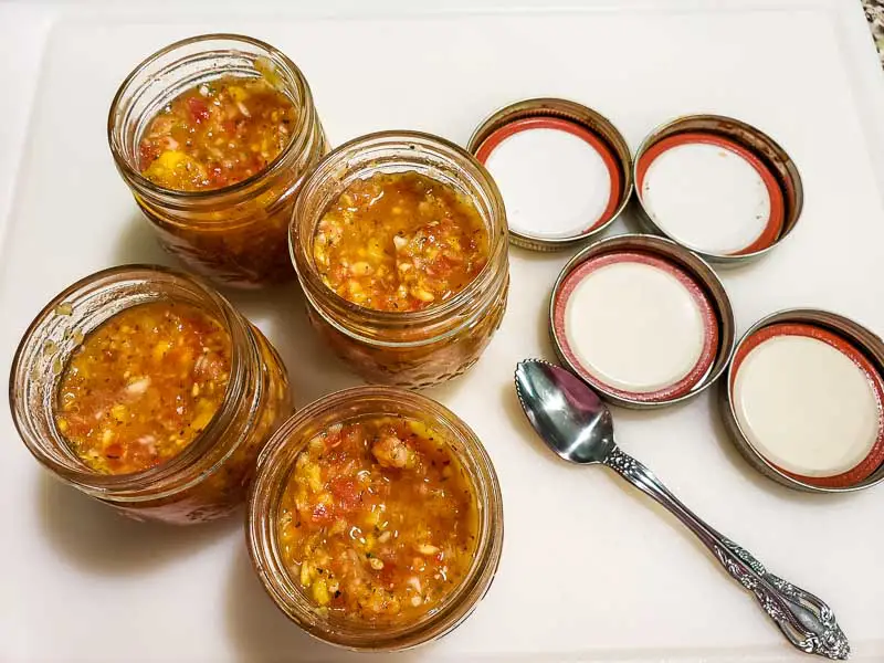 4 jars of tomato peach salsa.