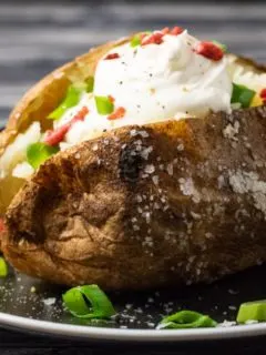 a Crispy Baked Potato on a plate.