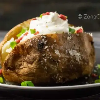 a salted crispy baked potato loaded with toppings