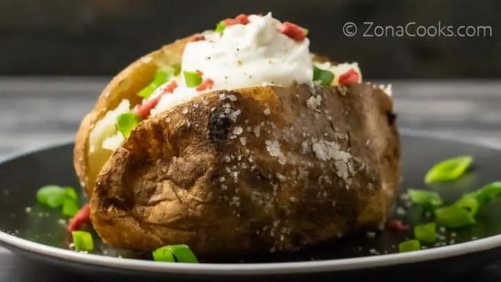 a salted crispy baked potato loaded with toppings