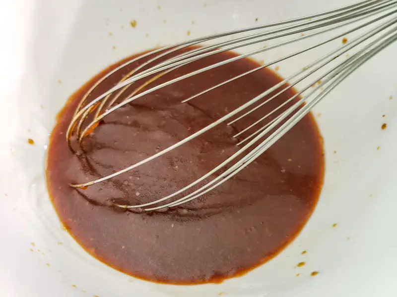 zesty bbq sauce whisked in a bowl