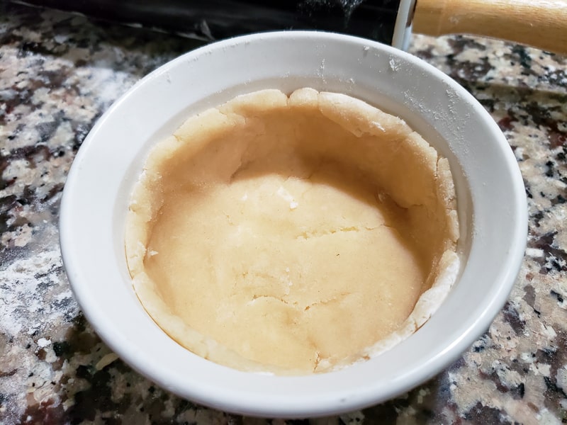 pastry dough pressed into a ramekin.